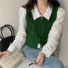 green-sweater-vest